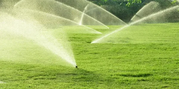 AAA Irrigation Service technician performing sprinkler repair